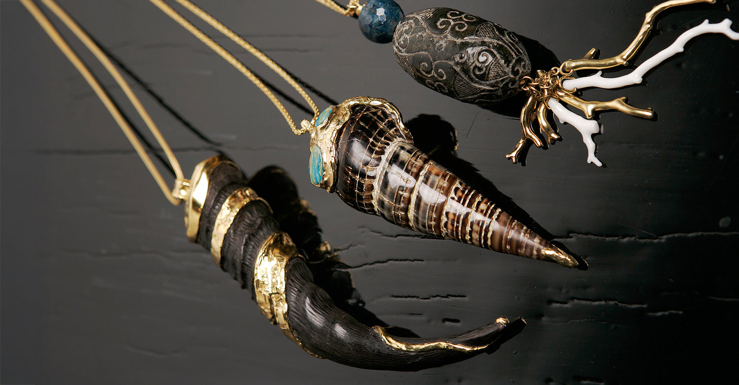 exquisite one-of-a-kind art jewelry necklaces featuring antelope horn, shell, and engraved Burma jade bead with gold