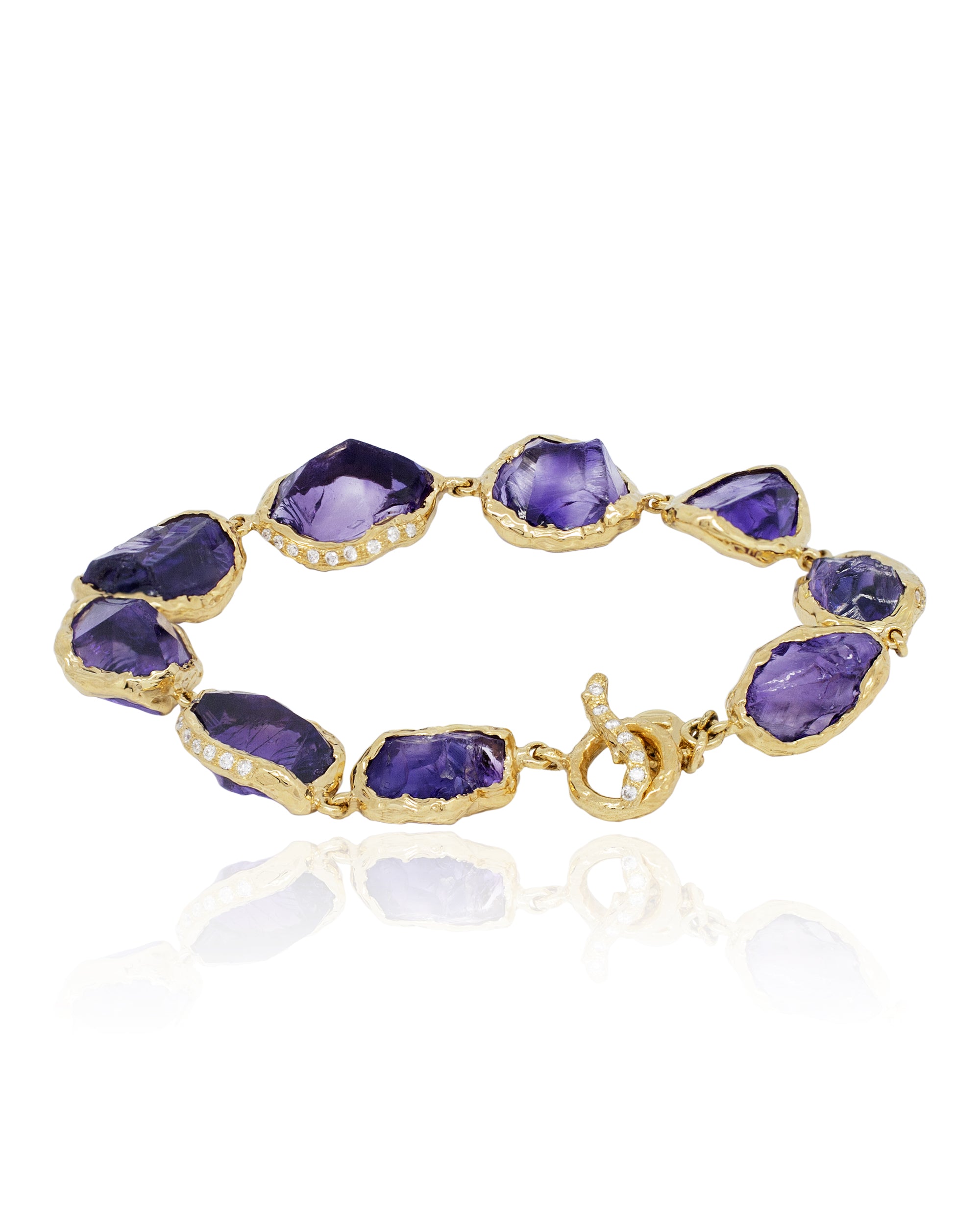 back product view of the Natalie Dissel 18K yellow gold Raw Natural Amethyst gemstone link bracelet with organic toggle clasp and white diamond details.
