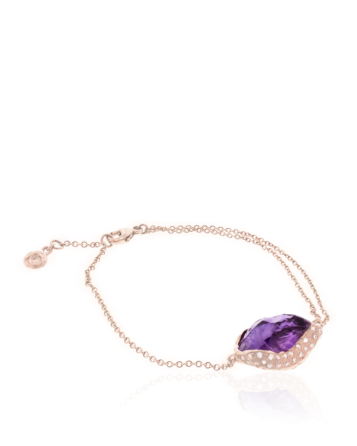 Close-up of the Natalie Dissel 18K rose gold bracelet featuring a Raw Natural Amethyst gemstone framed by white diamond details, Gem Rocks collection, macro product view.