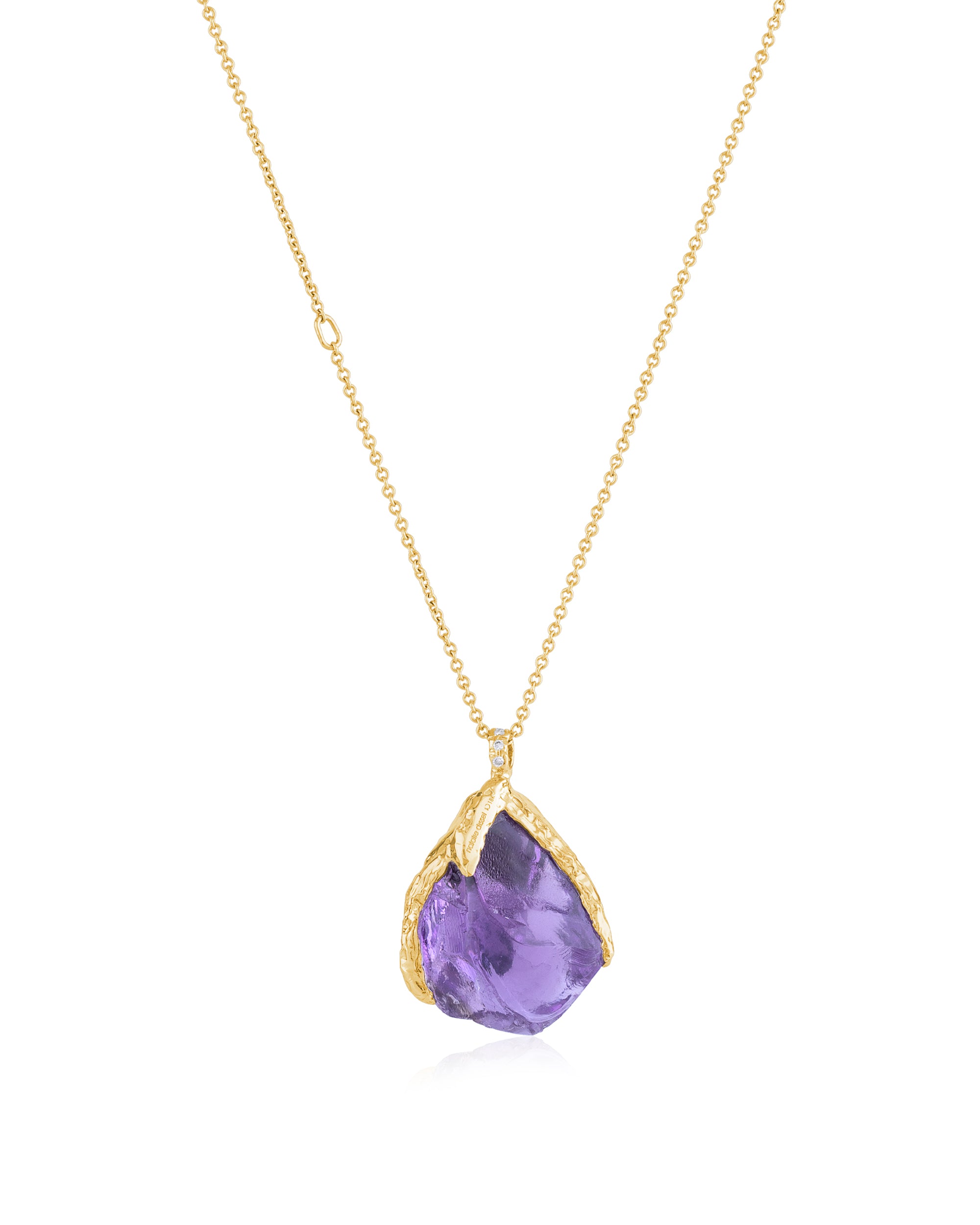 Back view of the Natalie Dissel 18K yellow gold necklace showing the raw Amethyst pendant set in an organic textured gold cap.