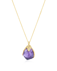 Front view of Natalie Dissel 18K yellow gold necklace featuring a raw Amethyst pendant capped with sparkling pavé white diamonds.