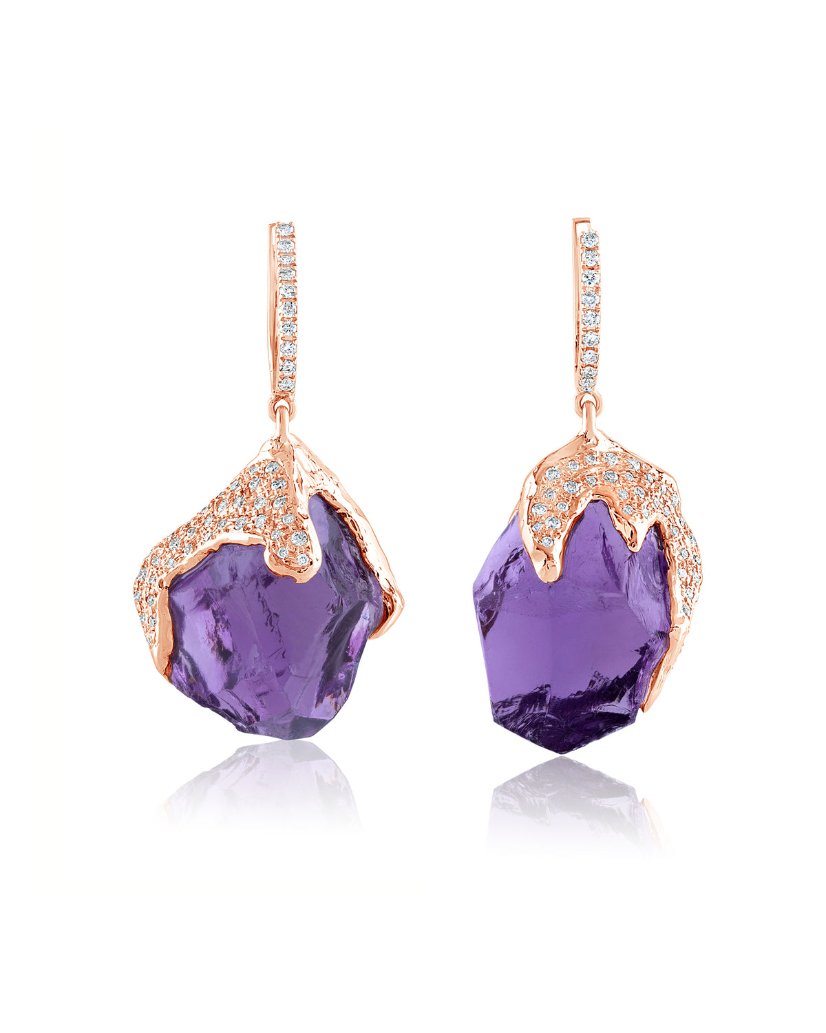 Pair of Natalie Dissel 18K rose gold drop earrings featuring raw Amethyst stones capped with pavé white diamonds, Gem Rocks collection.
