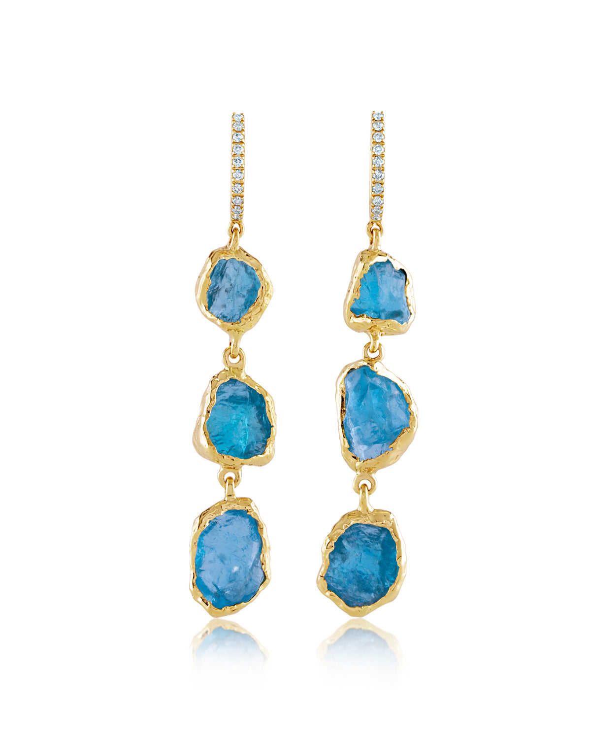 Front view of pair of Natalie Dissel 14K yellow gold long drop earrings with raw Blue Apatite stones and diamond-paved huggie hoops, Rough Rocks collection.