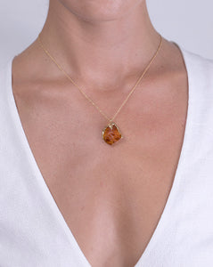 Model shot showcasing a high quality recycled 18K Yellow Gold necklace with a raw citrine pendant