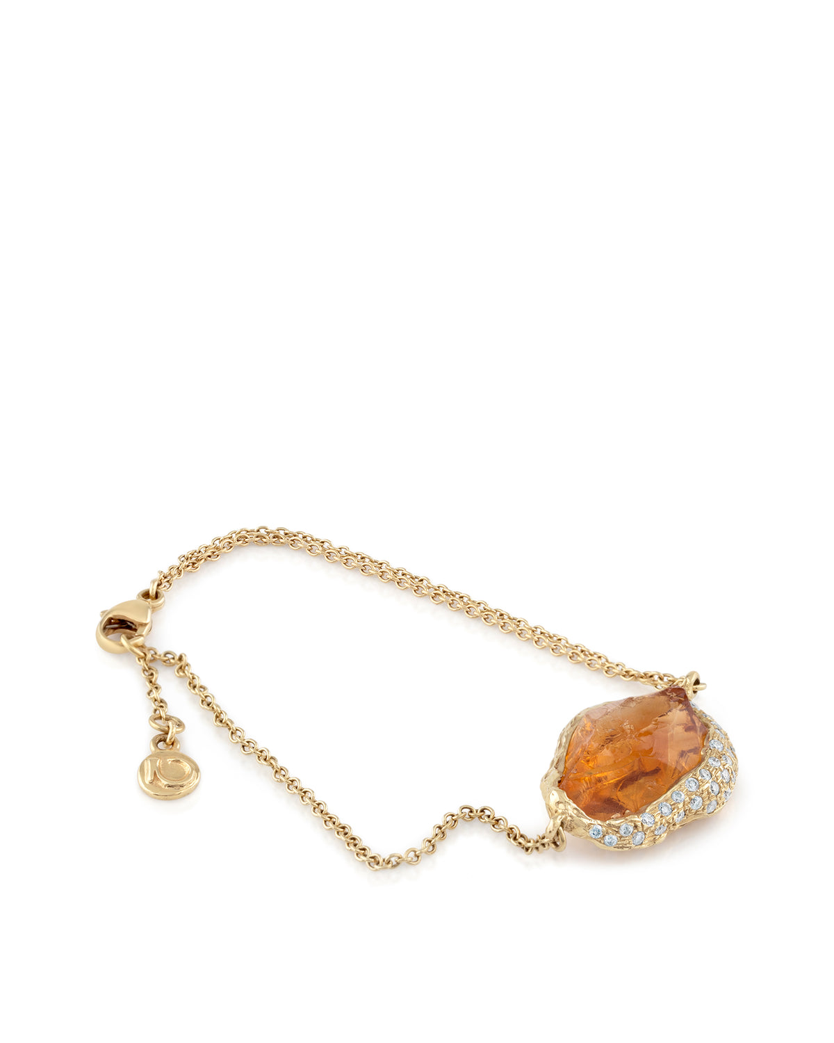 Natalie Dissel 18K yellow gold chain bracelet featuring a raw golden citrine gemstone set with diamond pave accents, Gem Rocks collection.