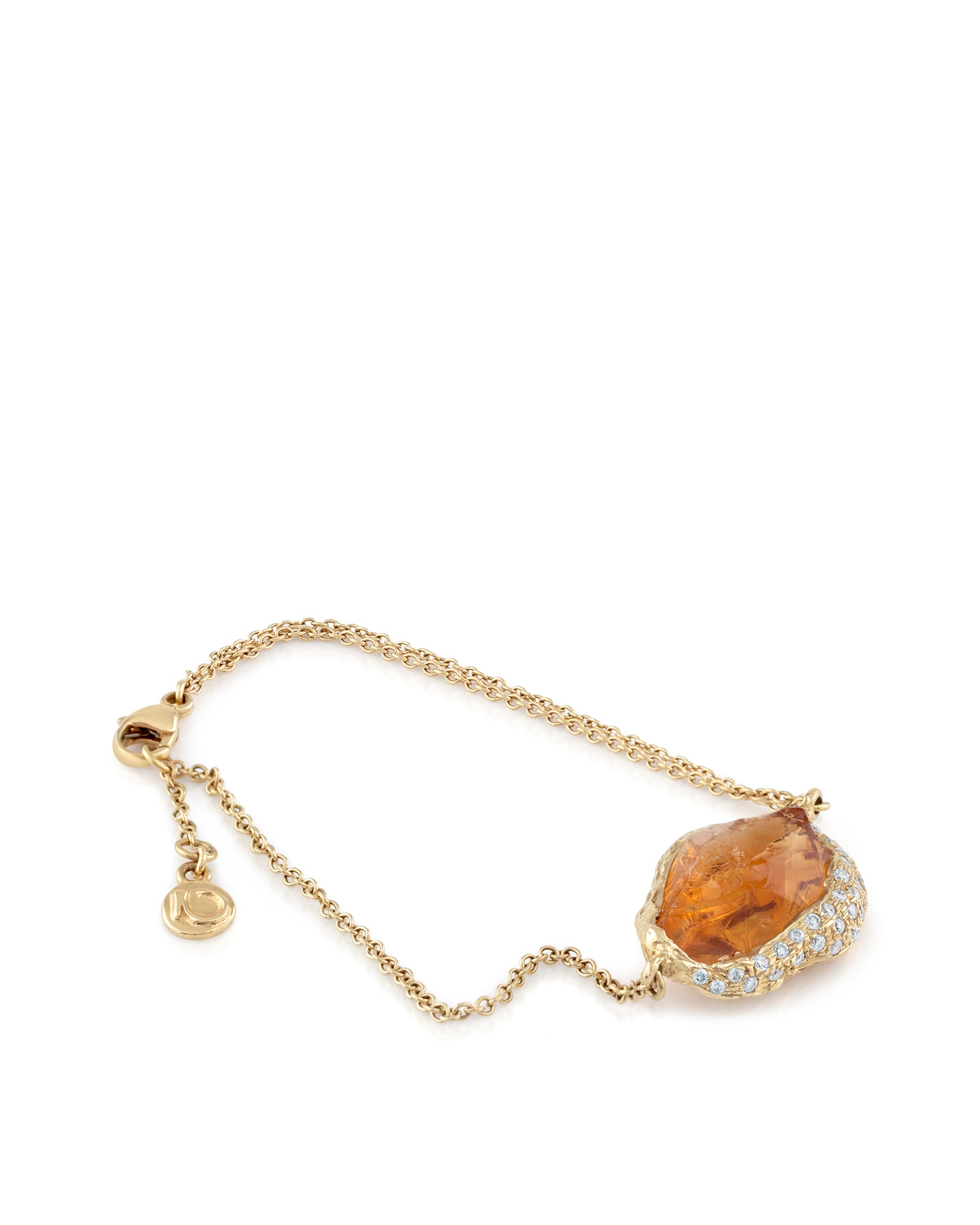 Natalie Dissel 18K yellow gold chain bracelet featuring a raw golden citrine gemstone set with diamond pave accents, Gem Rocks collection.