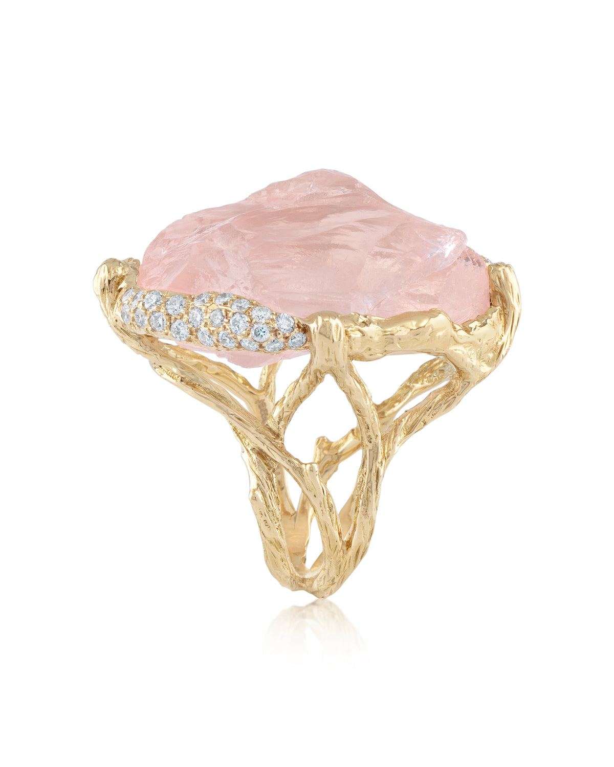 Side profile view of Natalie Dissel 18K yellow gold raw Rose Quartz ring displaying the intricate textured branch structure band and diamond accents.